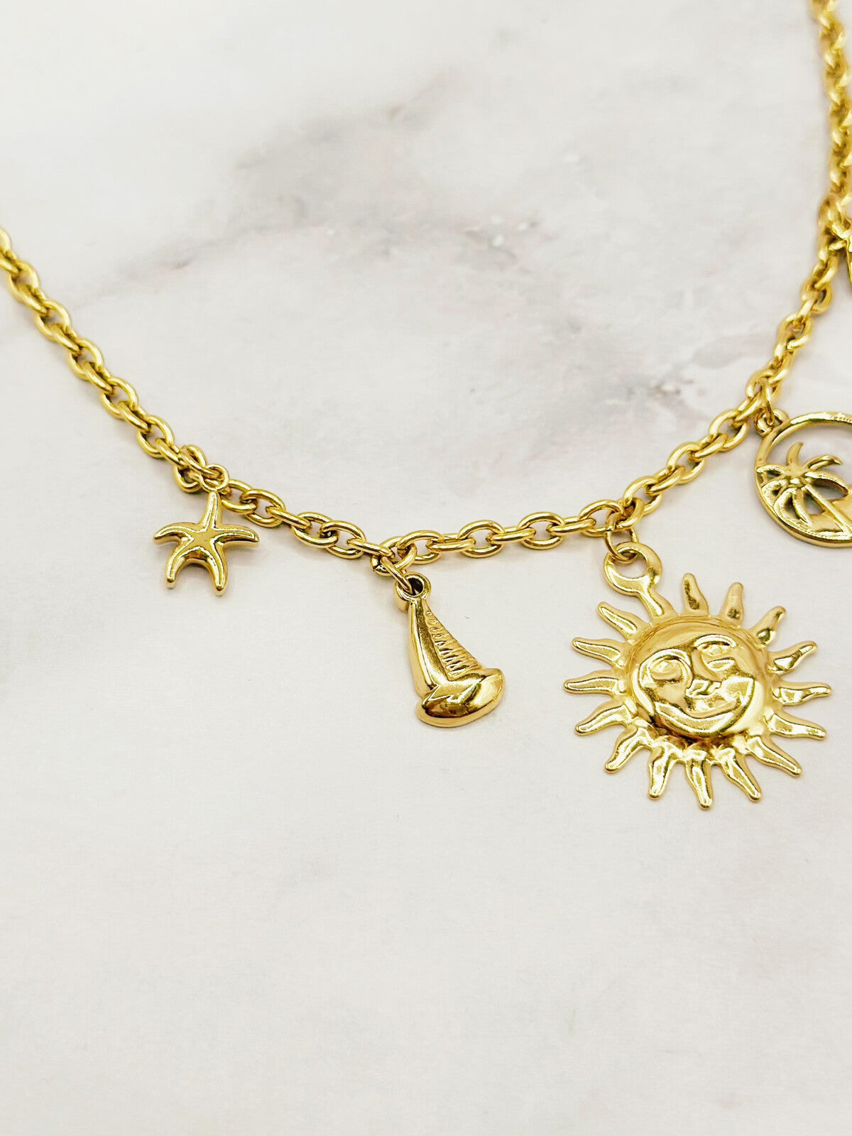 Collier breloques marins