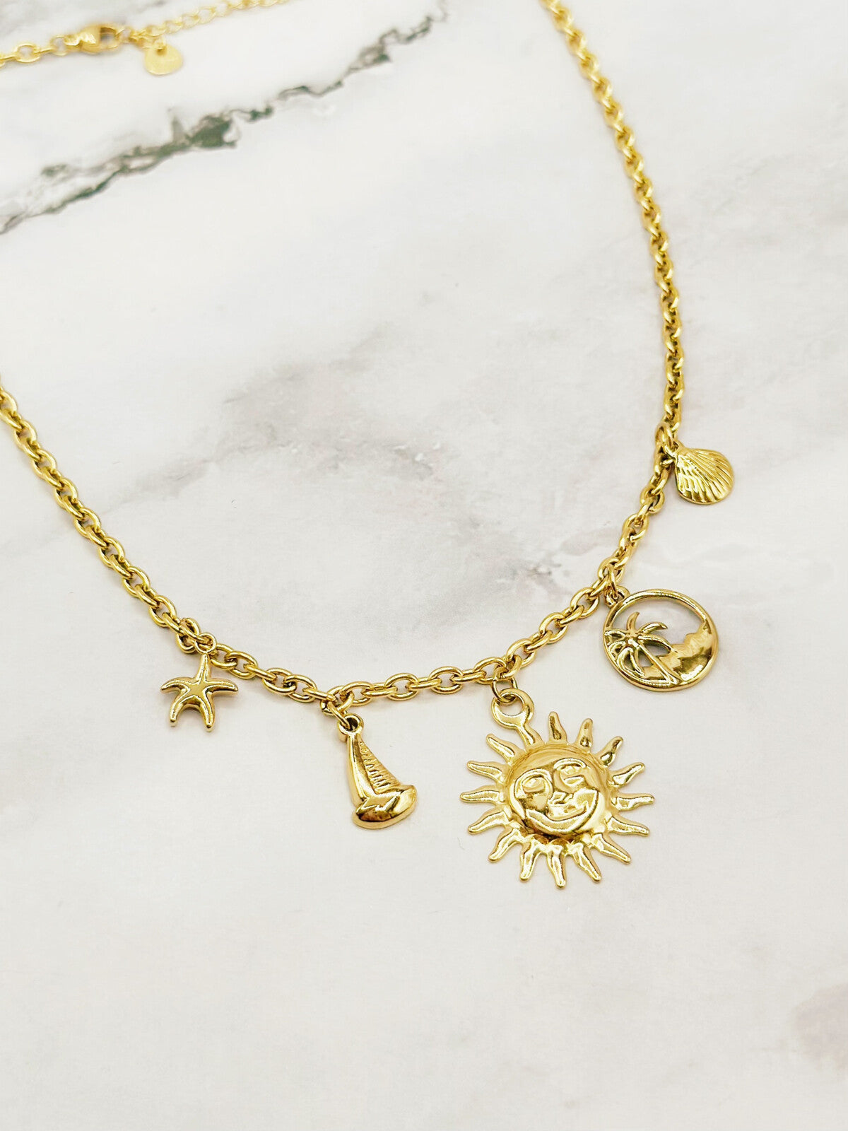 Collier breloques marins